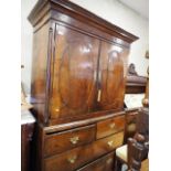 An oak linen press with box and ebony strung cornice, enclosed two doors (missing internal