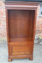 A walnut wardrobe enclosed two doors over fall front compartment, on shaped bracket feet, 38" wide x
