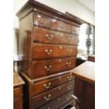 An early Georgian oak, mahogany banded and box and ebony strung chest on chest, the upper section