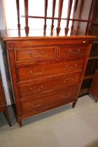 A cherrywood chest of two short and three long drawers, on square taper supports, 40" wide x 20"