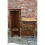 A carved oak cupboard, fitted one drawer over two doors, 24" wide x 19" deep x 33" high, and a