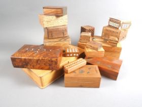 A collection of brass inlaid, mother-of-pearl inlaid and other boxes