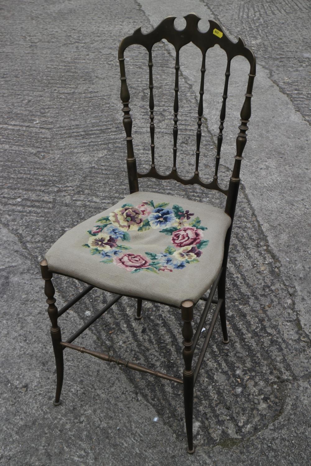 An early 20th century brass ballroom chair, on turned and stretchered supports