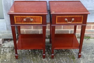 A pair of mahogany two-tier lamp tables, fitted drawers, on square taper supports, 16" square x