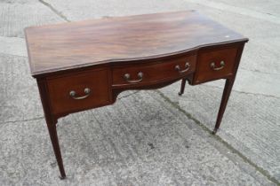 An Edwardian walnut box and ebony strung break bowfront dressing table, fitted two graduated drawers