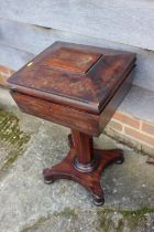 A 19th century mahogany teapoy with three caddies and blending bowl (as found), on faceted column