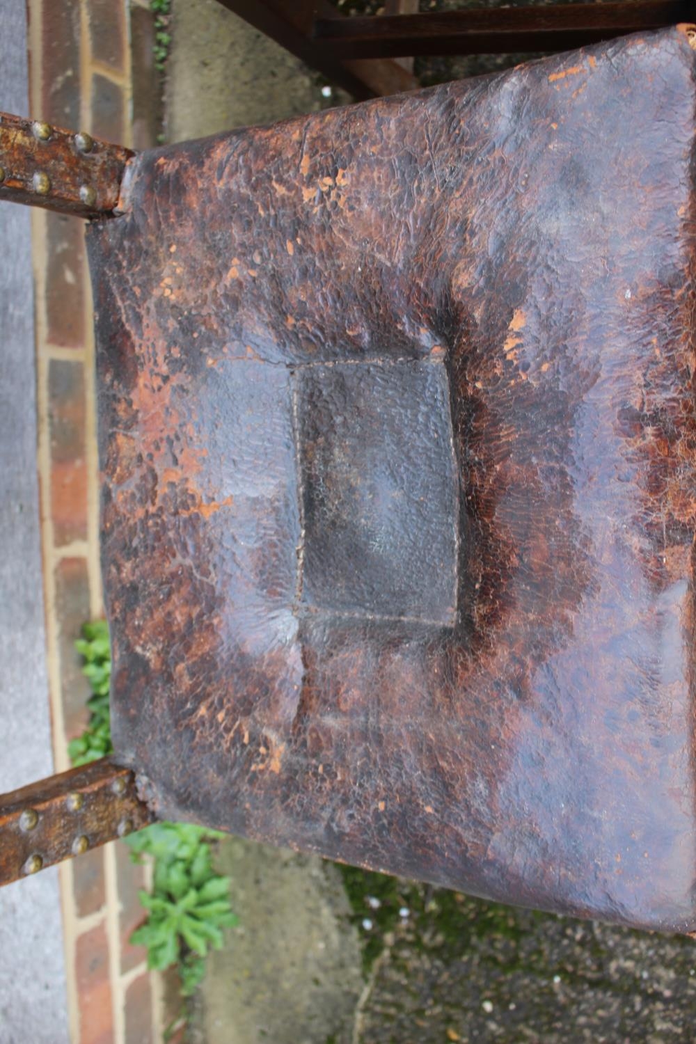 A pair of 18th century oak chairs with seats and back upholstered in a brown leather, on turned - Image 2 of 4