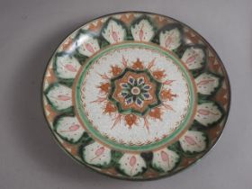 A Boughraat dish, 13" dia, a peacock decorated meat dish, 16 1/2" wide, and two other meat plates,