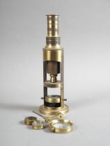 A 19th century brass portable microscope, by Steward 106 Strand, 7" high