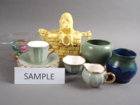 A Lingard Humpty Dumpty teapot, a Chinese green crackle glazed bowl, a Wade part teaset with