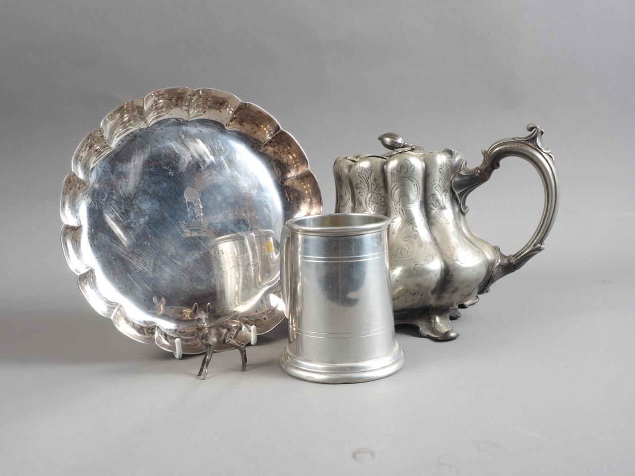 A silver model of a fawn, a silver plated lobed dish, a pewter teapot and a pewter half pint tankard