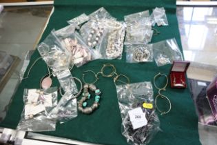 A selection of silver, white metal and yellow metal jewellery, various