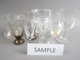 A 1960s smoked glass part table service and other table glass