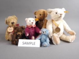 A Steiff Millennium Teddy bear, a purple Steiff Teddy bear and a number of vintage Teddy bears,