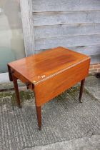 A 19th century mahogany Pembroke table, fitted one drawer, on square tapered castored supports , 32"