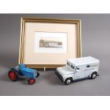 A Dinky Toys Brink's security van, a die-cast tractor and an etching, "Budapest"