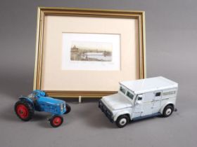 A Dinky Toys Brink's security van, a die-cast tractor and an etching, "Budapest"
