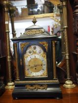 An ebonised and gilt metal mounted bracket clock with eight-day striking and chiming movement on