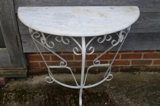 A wrought iron and marble top semicircular console table, 36" wide x 17" deep x 28" high