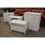 A white lacquered finish chest of four drawers, 36" wide, a companion cupboard, a television stand