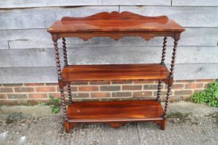 A 19th century rosewood three-tier whatnot, 36" wide x 12" deep x 36" high