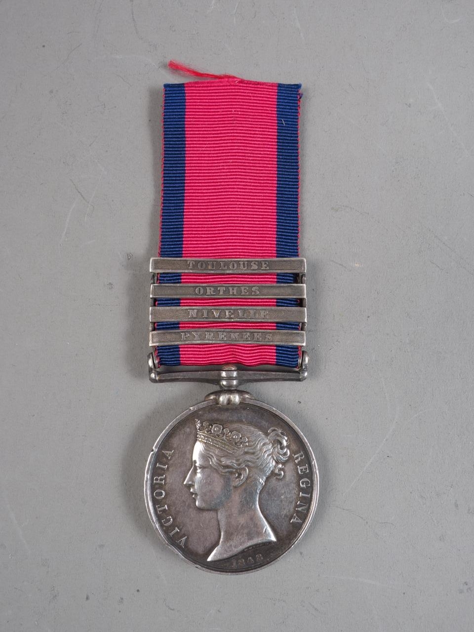 A military General Service medal 1793/1814, awarded to Archibald Buchanan 91st Foot, with