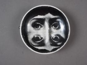 A Fornasetti "Tema e Variazioni" saucer dish, 5 1/8" dia