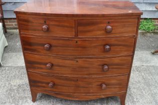 A 19th century mahogany bowfront chest of two short and three long graduated drawers with knob