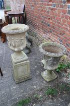 A cast stone campana urn with figure decoration, 16" dia x 22" high, and a similar urn, on stand