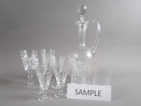 A cut glass claret jug and a collection of cut and other table glass