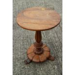 A William IV mahogany circular top occasional table, on turned and carved column, circular base