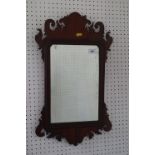 3-A walnut framed wall mirror of early 18th century design with shaped crest and plate, 23 1/2" high