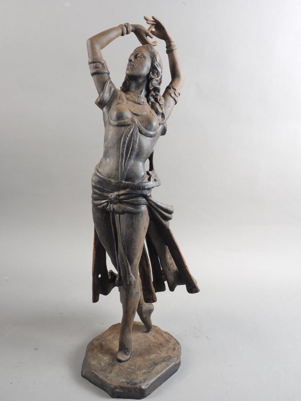 An Art Deco cast iron figure of a Turkish dancer, 19" high