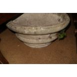 A cast stone planter with swag decoration, 20 1/2" dia x 20" high