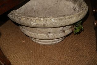 A cast stone planter with swag decoration, 20 1/2" dia x 20" high