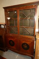 A Sheraton Revival satinwood and rosewood banded, box wood and ebony strung display cabinet/bookcase