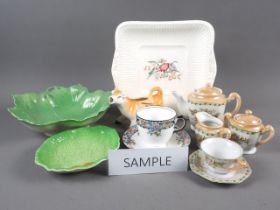 A doll's Japanese porcelain part tea service, two pieces of Carlton leaf ware, a Delphine China