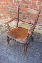 A 19th century Oxford bar back elbow chair with burr elm seat, on turned and stretchered supports