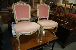 A pair of James Shoolbred  Louis XVI design carved giltwood showframe salon chairs with padded backs
