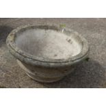A cast stone circular planter, 24" dia