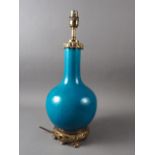 A Chinese turquoise glazed bottle vase with gilt metal mounts (now converted as a table lamp), 17