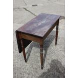 A 19th century mahogany single drop leaf dining table, on turned and tapering supports, 34 1/2" wide