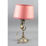 A ship's brass gimballed table/wall lamp, 15" high