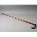 A walking stick with red Bakelite handle, 36 1/4" long