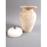 An Egyptian alabaster jar, 7 1/2" high, and an alabaster powder bowl with patinated knob handles, 4"