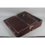 A 19th century mahogany and brass mounted writing box with fitted interior, secret drawers and