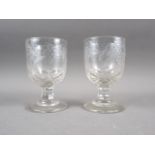 A pair of 19th century cut glass goblets with engraved vine leaf decoration, on faceted stems, 5 3/
