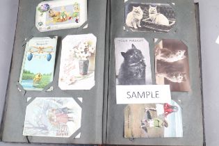 An early 20th century postcard album and a collection of early postcards, various