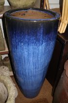 A blue glazed cylindrical planter, 15" dia x 35" high