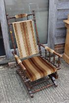 An American polished as walnut rocking chair